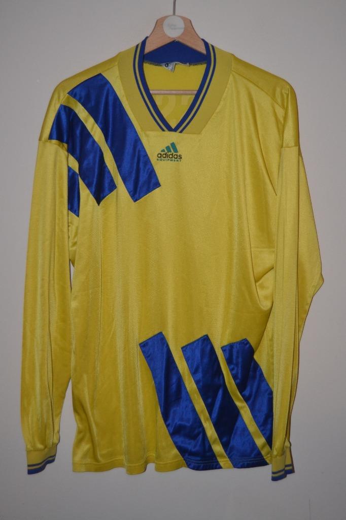 blue and yellow adidas shirt