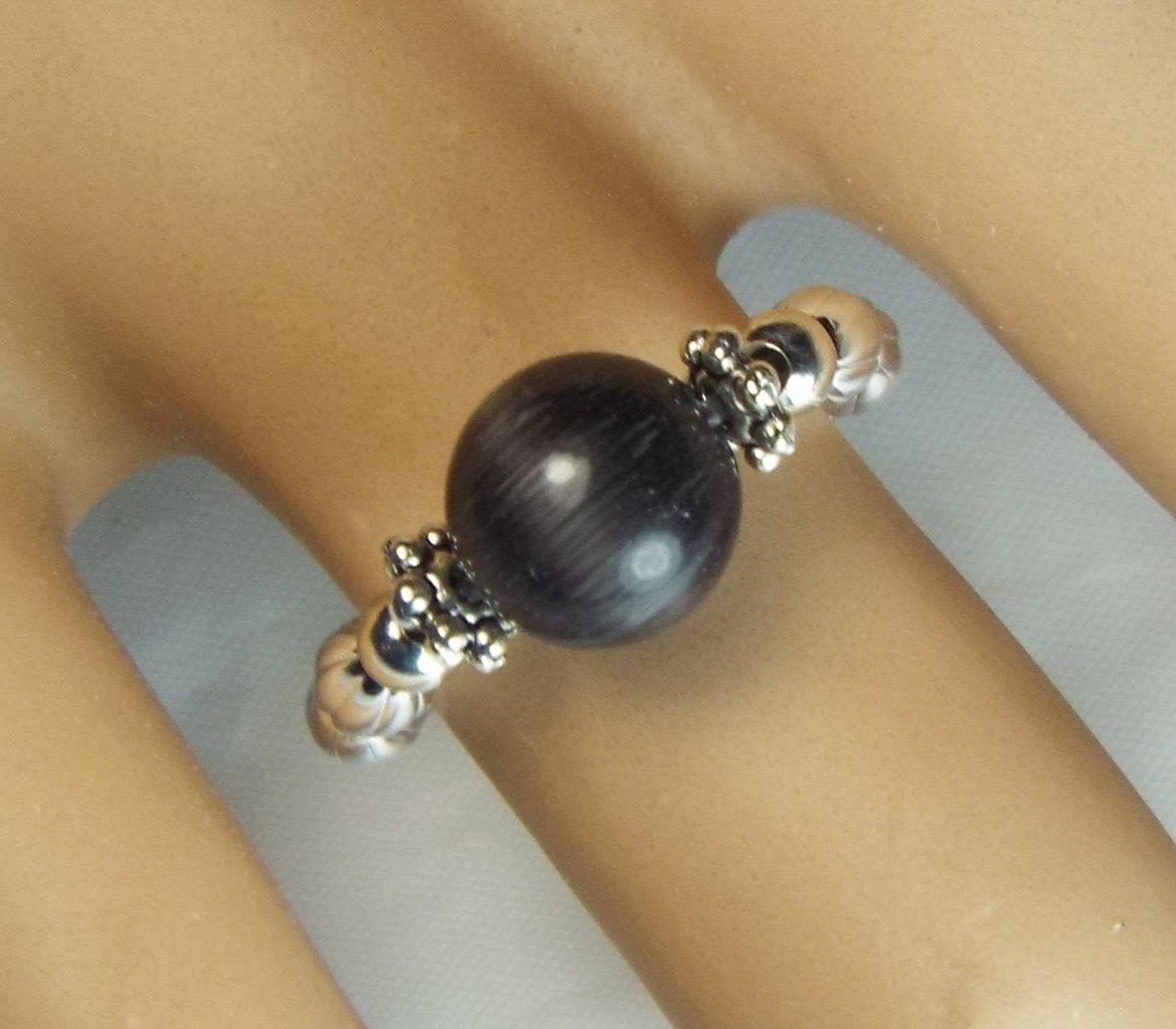 ANILLOS ELÁSTICOS SOLITARIO OJO DE GATO CYNTHIA LYNN "EYE CANDY" PLATA ESTERLINA - Imagen 2 de 11