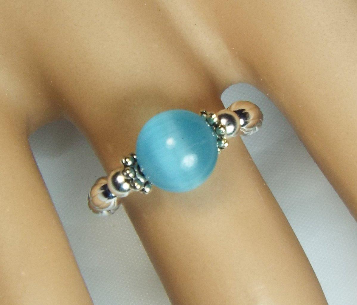 ANILLOS ELÁSTICOS SOLITARIO OJO DE GATO CYNTHIA LYNN "EYE CANDY" PLATA ESTERLINA - Imagen 9 de 11