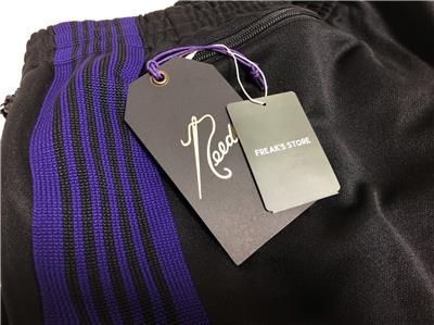 Black Narrow Track Pants by NEEDLES on Sale