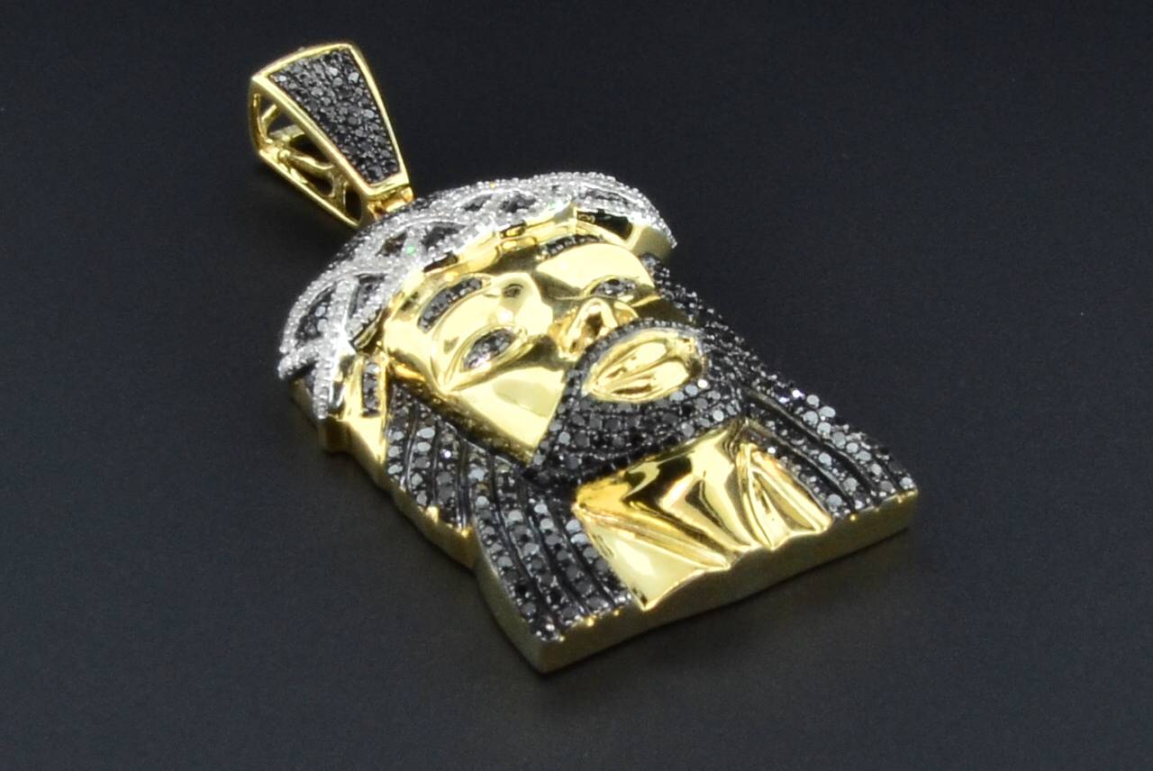 有关以下物品的详细资料: black diamond mini jesus