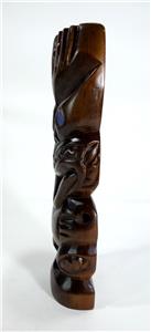 Rare Māori artefacts including carving exhibited by the