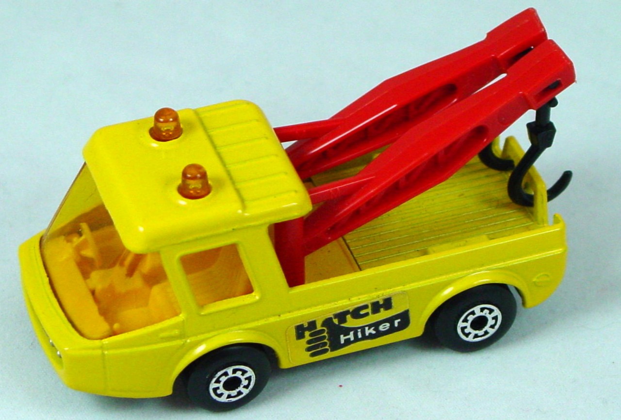 Lesney SuperFast 74 B 22 - Toe Joe yel-Orange unp red and black 5A Hitchhiker amber window