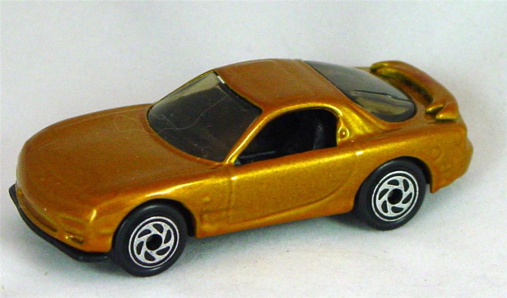 Pre-production 08 J 14 - Mazda RX7 GOLD C Gold made in Thailand 7-spk spiral