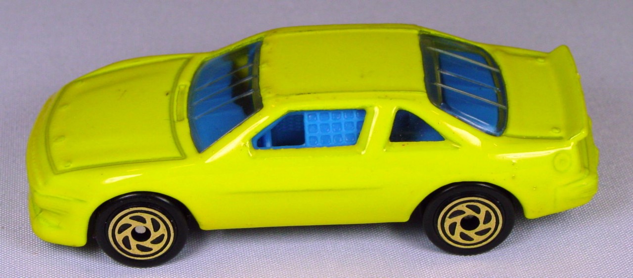 Pre-production 35 H - Pontiac Grand Prix Brit Yellow blue interior no tampo made in Thailand